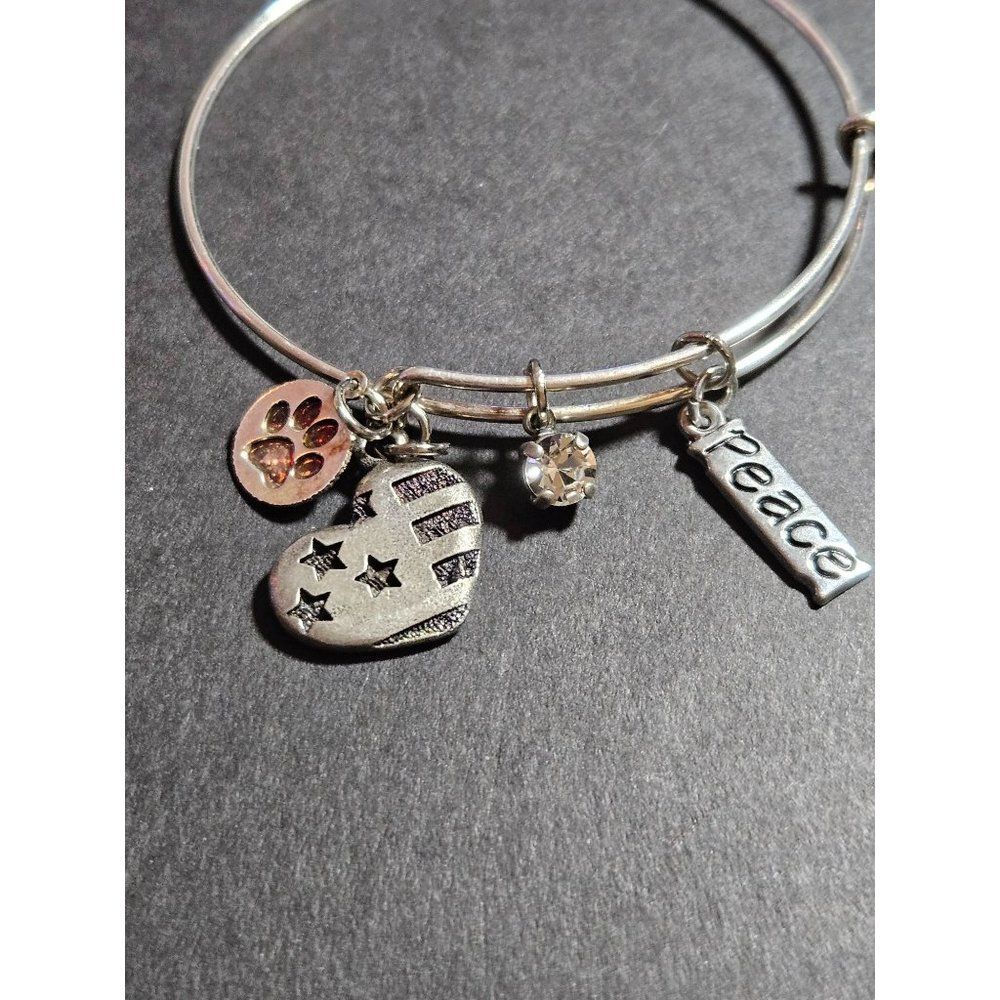 Silver tone adjustable bangle bracelet paw peace charm patriotic